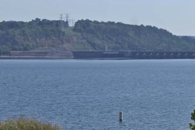 Eufaula Dam across open blue water from Ladybird Landing
